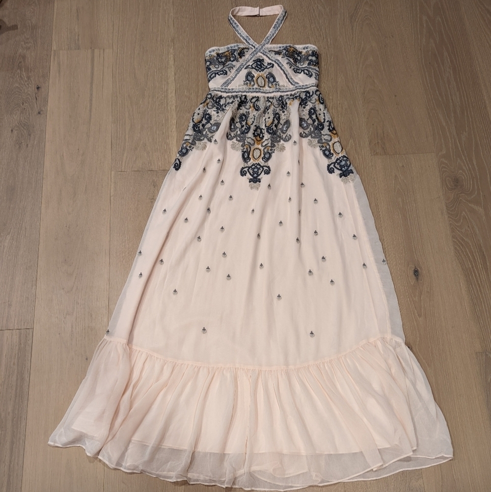 Elegant Embellished Dress with Ruffle Hem